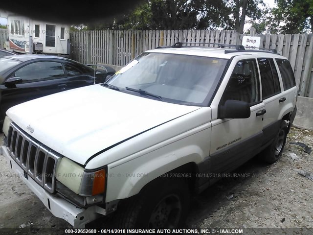 1J4FX58S5VC664044 - 1997 JEEP GRAND CHEROKEE LAREDO/TSI WHITE photo 2