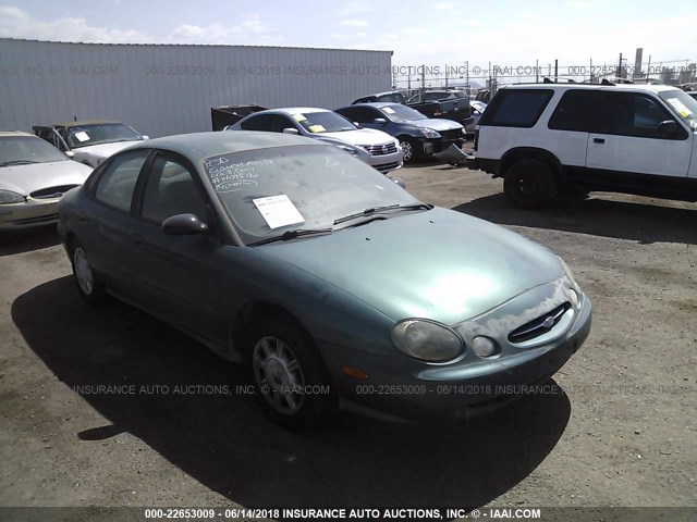 1FAFP52U9WG138922 - 1998 FORD TAURUS LX/SE GREEN photo 1