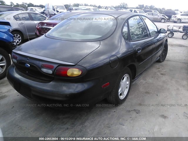 1FALP52U9VA300276 - 1997 FORD TAURUS GL BLACK photo 4