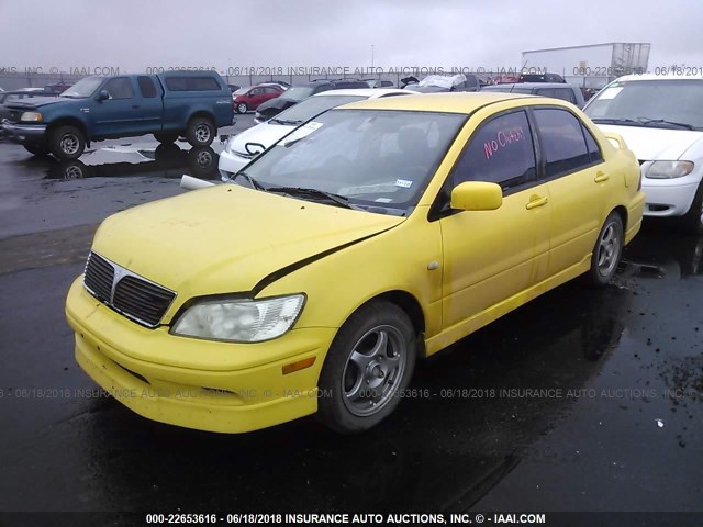 JA3AJ86E42U059145 - 2002 MITSUBISHI LANCER OZ RALLY YELLOW photo 2