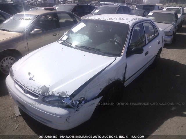 1NXBR12E0XZ224316 - 1999 TOYOTA COROLLA VE/CE/LE WHITE photo 2