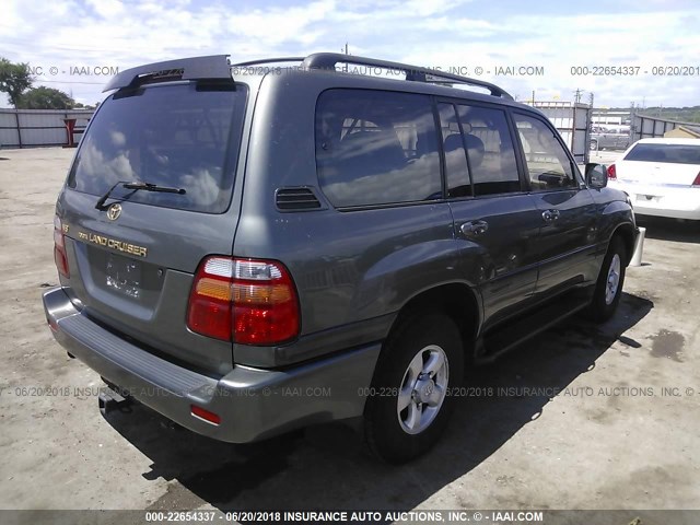 JT3HT05J4X0057103 - 1999 TOYOTA LAND CRUISER  GRAY photo 4