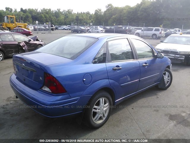 1FAFP34Z33W229540 - 2003 FORD FOCUS SE COMFORT/SE SPORT BLUE photo 4