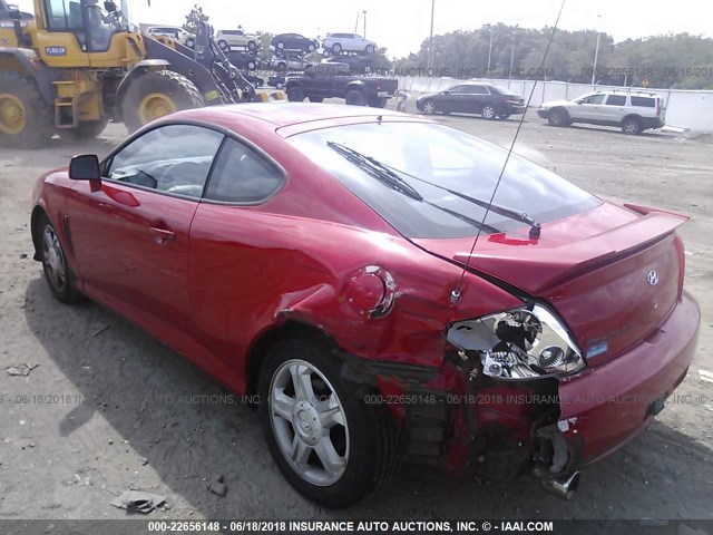 KMHHM65D33U064757 - 2003 HYUNDAI TIBURON RED photo 6