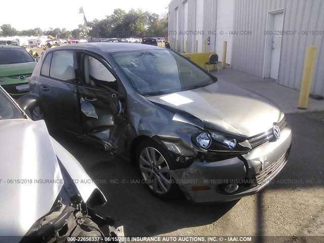 WVWNM7AJ3CW264129 - 2012 VOLKSWAGEN GOLF SILVER photo 1