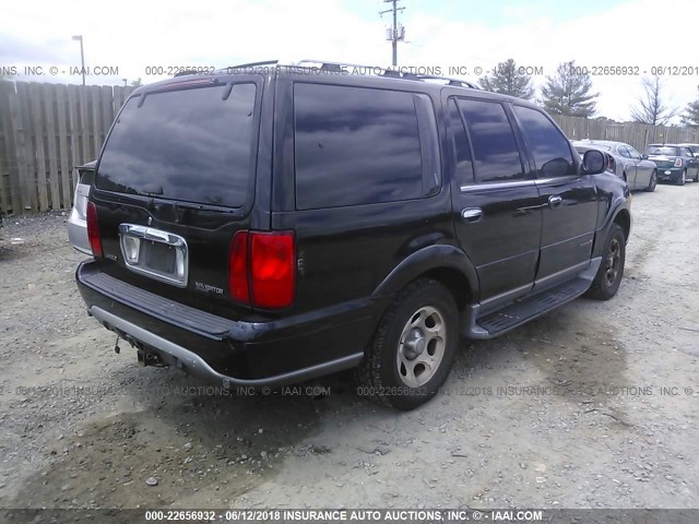 5LMFU28R22LJ06702 - 2002 LINCOLN NAVIGATOR BLACK photo 4