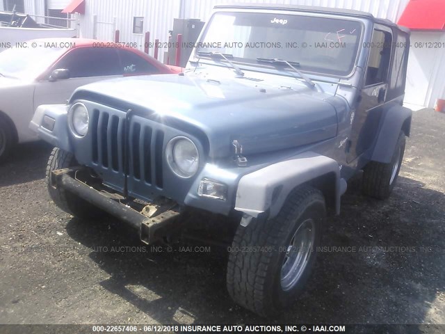 1J4FY19S0WP798216 - 1998 JEEP WRANGLER / TJ SPORT GRAY photo 2