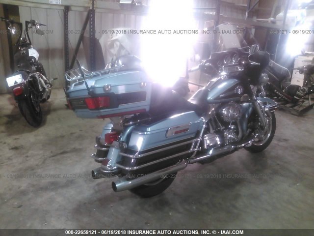 1HD1FC4197Y680966 - 2007 HARLEY-DAVIDSON FLHTCUI Light Blue photo 4