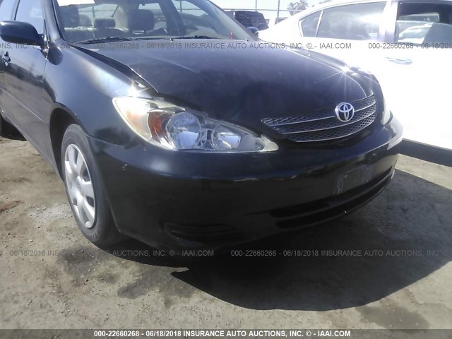 4T1BE30KX4U299231 - 2004 TOYOTA CAMRY LE/XLE/SE შავი ფოტო 6