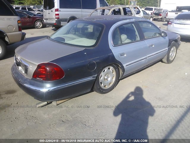 1LNFM97VXWY604200 - 1998 LINCOLN CONTINENTAL  Dark Blue photo 4