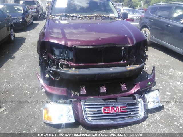 1GKDT13SX72249632 - 2007 GMC ENVOY MAROON photo 6