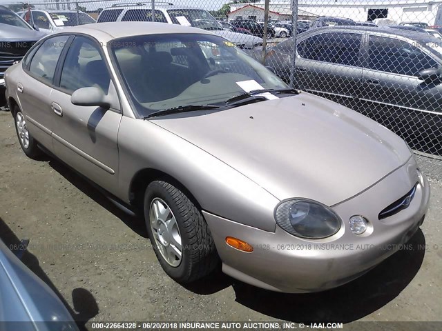 1FAFP52U7XA205229 - 1999 FORD TAURUS LX GOLD photo 1