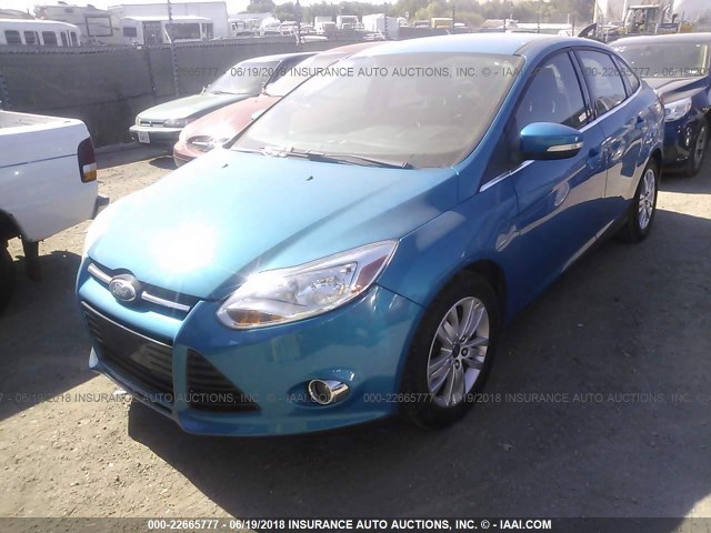 1FAHP3H28CL372426 - 2012 FORD FOCUS SEL BLUE photo 2