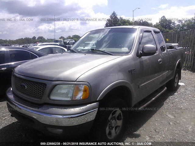 2FTRX18W82CA96389 - 2002 FORD F150 GOLD photo 2