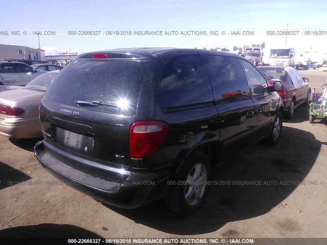 1D4GP45R45B343630 - 2005 DODGE CARAVAN SXT BLACK photo 4