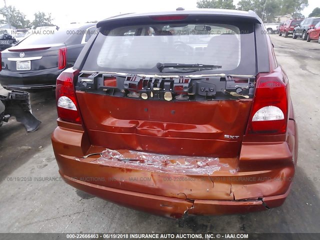 1B3HB48A69D112505 - 2009 DODGE CALIBER SXT ORANGE photo 6