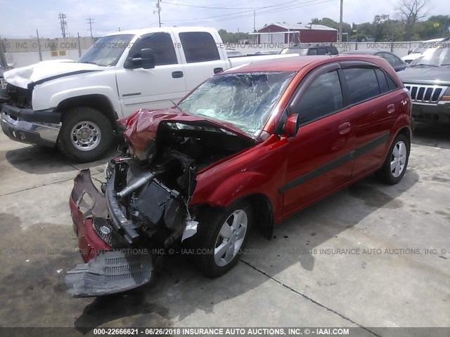 KNADE243496532930 - 2009 KIA RIO 5 SX RED photo 2