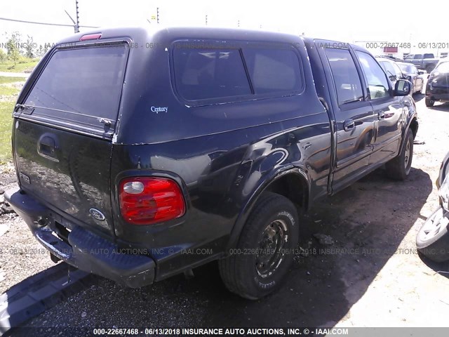 1FTRW08L01KF83082 - 2001 FORD F150 SUPERCREW BLACK photo 4
