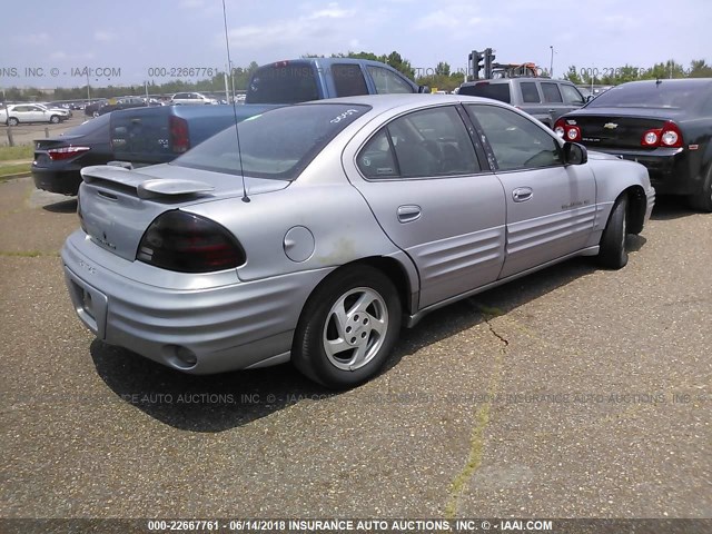 1G2NE52T3XC543500 - 1999 PONTIAC GRAND AM SE GRAY photo 4