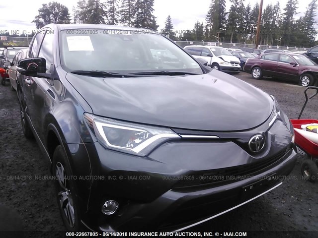 2T3RFREV9JW796310 - 2018 TOYOTA RAV4 ADVENTURE/XLE 灰色 照片 1