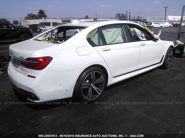 WBA7F0C51GGM20899 - 2016 BMW 750 I WHITE photo 4
