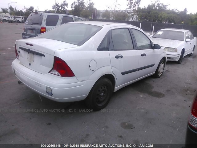 1FAFP33P63W169804 - 2003 FORD FOCUS LX WHITE photo 4