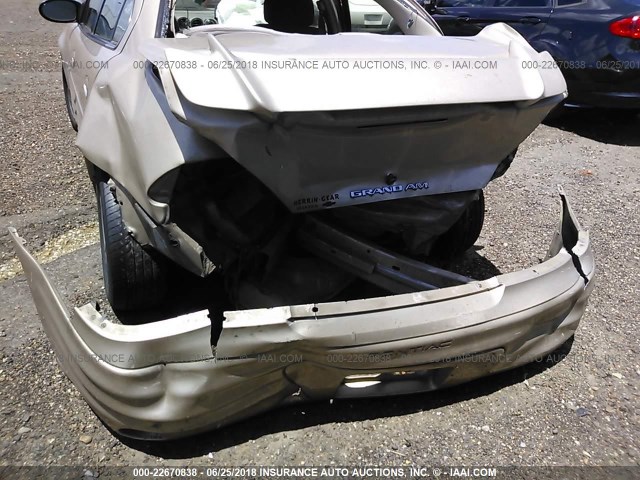 1G2NF52F12C277586 - 2002 PONTIAC GRAND AM SE1 GOLD photo 6