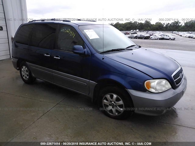 KNDUP131246579924 - 2004 KIA SEDONA EX/LX BLUE photo 1