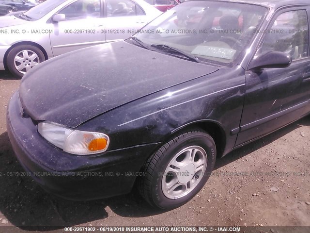1Y1SK52872Z401784 - 2002 CHEVROLET GEO PRIZM LSI BLACK photo 6