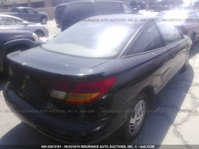 1G8ZH1273XZ180509 - 1999 SATURN SC2 BLACK photo 4