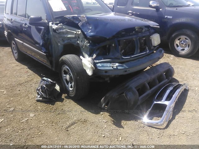 2CNBE13C336941018 - 2003 CHEVROLET TRACKER BLUE photo 1