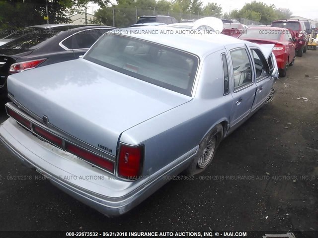 1LNLM81W2VY740382 - 1997 LINCOLN TOWN CAR EXECUTIVE BLUE photo 4
