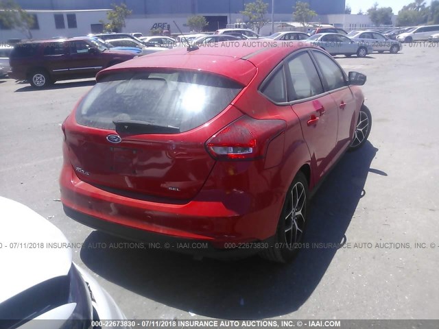 1FADP3M23HL225068 - 2017 FORD FOCUS SEL RED photo 4