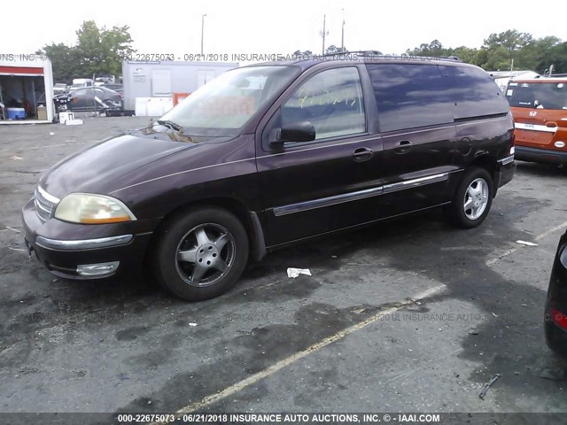 2FMDA5245XBB69348 - 1999 FORD WINDSTAR SE PURPLE photo 2