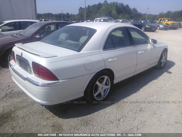 1LNHM87A0YY750754 - 2000 LINCOLN LS WHITE photo 4