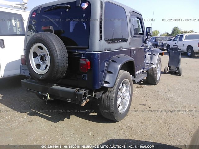 1J4FA49S72P715266 - 2002 JEEP WRANGLER / TJ SPORT BLUE photo 4