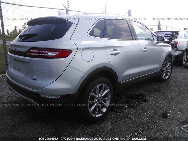 5LMCJ2C90GUJ27245 - 2016 LINCOLN MKC SELECT SILVER photo 4