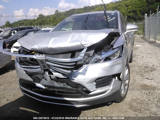 5LMCJ2C90GUJ27245 - 2016 LINCOLN MKC SELECT SILVER photo 6