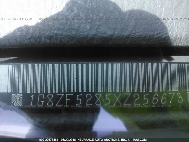 1G8ZF5285XZ256673 - 1999 SATURN SL BLACK photo 9