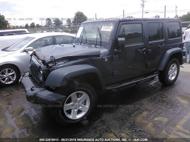 1C4BJWDG8GL335158 - 2016 JEEP WRANGLER UNLIMITE SPORT GRAY photo 2