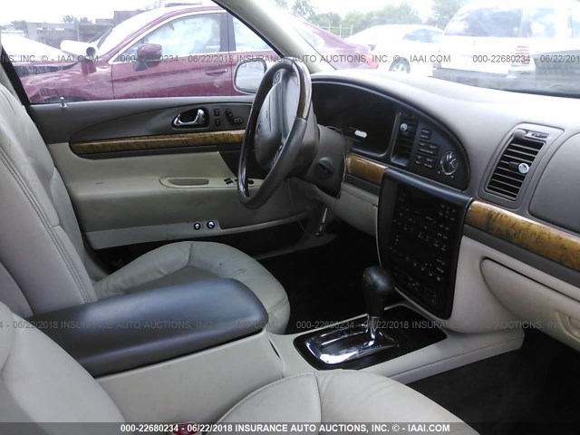 1LNHM97V3XY693747 - 1999 LINCOLN CONTINENTAL  Creme Foto 5