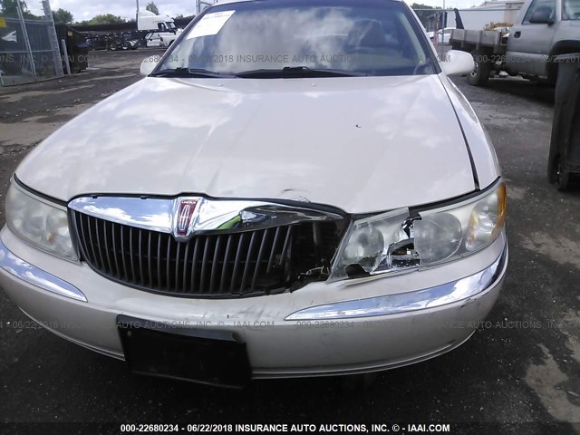 1LNHM97V3XY693747 - 1999 LINCOLN CONTINENTAL  CREAM photo 6