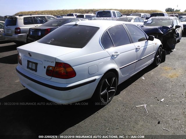 WBAEW53454PN35514 - 2004 BMW 330 XI WHITE photo 4