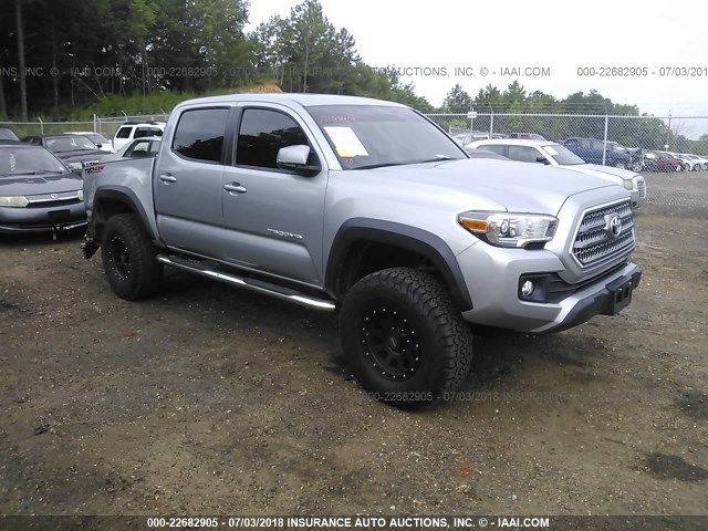 5TFCZ5AN6GX003996 - 2016 TOYOTA TACOMA DBL CAB/SR/SR5/TRD SPT/OR SILVER photo 1