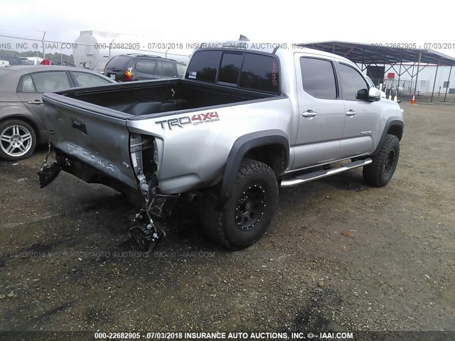 5TFCZ5AN6GX003996 - 2016 TOYOTA TACOMA DBL CAB/SR/SR5/TRD SPT/OR SILVER photo 4