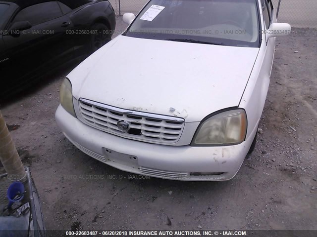 1G6KF57974U229804 - 2004 CADILLAC DEVILLE DTS WHITE photo 6