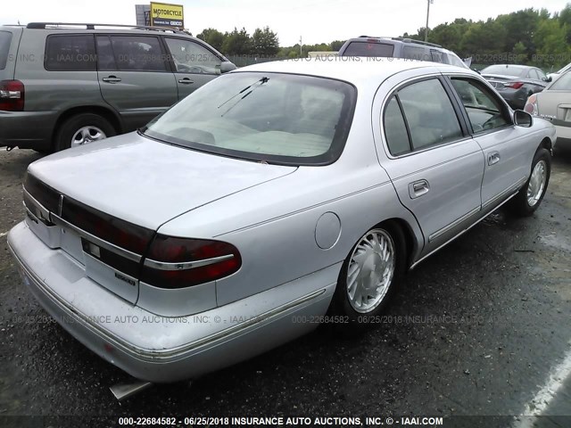 1LNLM97V5VY648283 - 1997 LINCOLN CONTINENTAL  SILVER photo 4