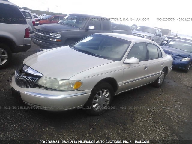 1LNHM97V2XY676082 - 1999 LINCOLN CONTINENTAL  CREAM photo 2