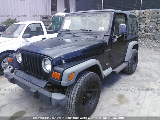 1J4FA29PXYP719515 - 2000 JEEP WRANGLER / TJ SE BLACK photo 2