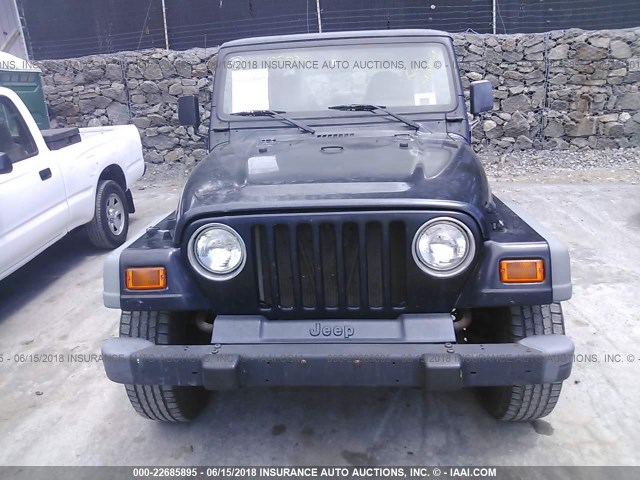 1J4FA29PXYP719515 - 2000 JEEP WRANGLER / TJ SE BLACK photo 6